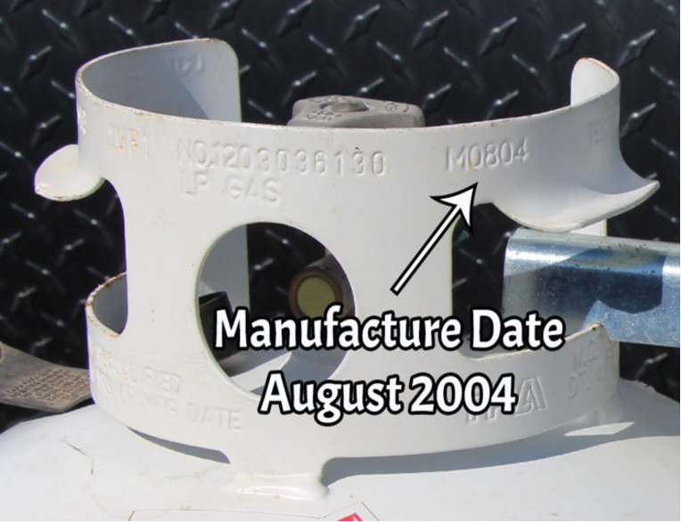metal collar of the propane tank with manufactureing date