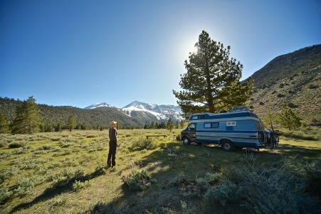 Women enjoying RV trip on hills