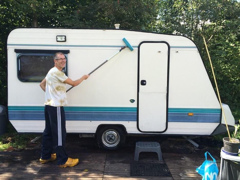 man doing RV cleaning 