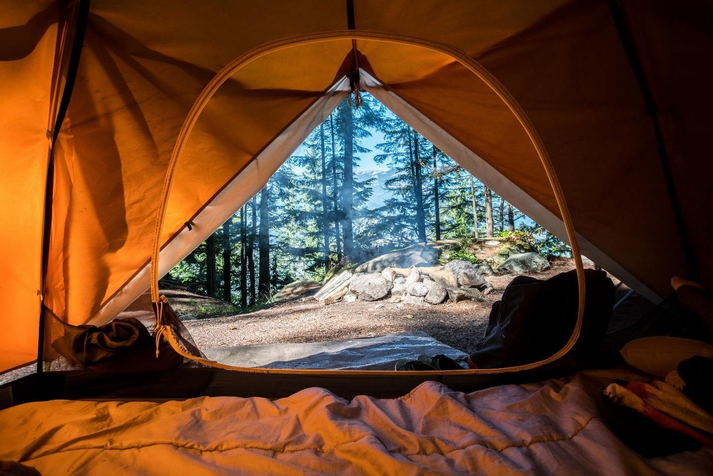 A picture containing tent, camping, tarpaulin, outdoor Description automatically generated
